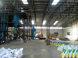 Business manufacturing animal feed, selling to 50 dealers in North India.