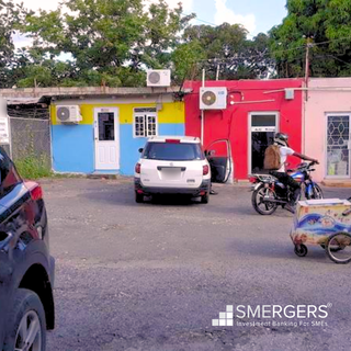 Purchase a 20-year-old car repair business with past JMD 10M revenue, requiring strong management.