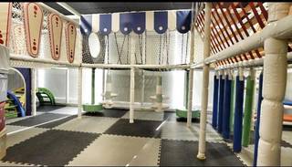 Investment opportunity in a thriving party hall with a fully equipped kitchen and play area.
