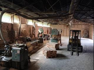 Sawmill with machinery for wood drying, steaming, briquette production, and warehouse facilities is available for-lease.