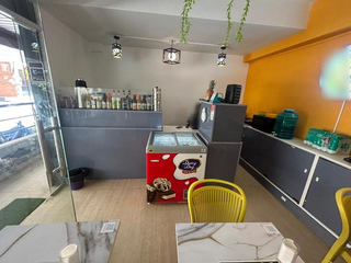 Cozy café and bakery for sale in Yelahanka, known for quality food and loyal patrons.