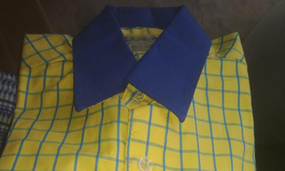Business manufactures uniforms and trades school related products such as belts, shoes, have served over 100 schools.