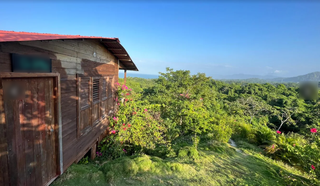 Eco-lodge in Santa Marta offering private jungle cabins, with owned land, and expansion potential.
