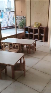 Navi Mumbai preschool operating for 7 years serves 55 students with daycare, with 10 staff.