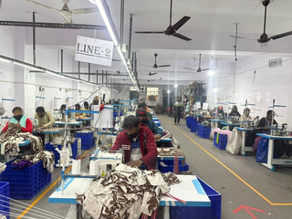 Business specializing in manufacturing women's textiles located in Delhi with 75,000 unit capacity per month.