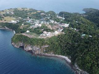 Upscale boutique resort with huge development possibilities. Private beach access with Reef for dive shop.