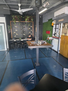 Full sale of vibrant restaurant and bar showcasing Caribbean-style cuisine and local charm.