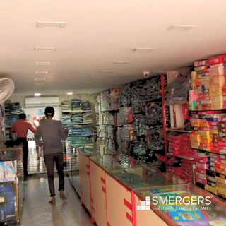 Ahmedabad-based family showroom retailing diverse garments, specializing in school uniforms with 15-20 daily customers.