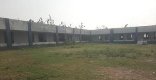 Non-operational school property in Ulundurpetai, featuring vacant land and building, ideal for reopening educational institution.