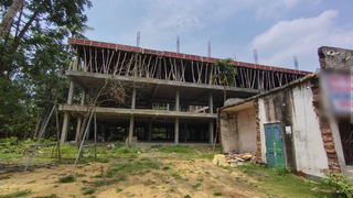 Partially constructed school property in West Bengal with sanctioned expansion potential available for outright sale.