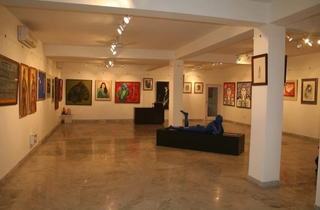 Legacy Delhi art gallery selling 700+ original paintings from 125 artists, including Hussain and Burman.