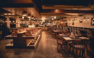 For sale: Authentic North Indian restaurant offering vegetarian and non-vegetarian cuisine with dine-in and delivery.