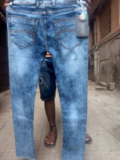 Jeans manufacturer having tie ups with wholesalers in multiple cities.