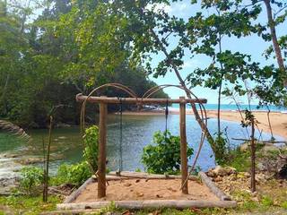 Dual-purpose recreational and car care hub near PNG/Indo border, catering to both locals and tourists.