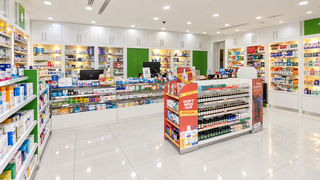 Prime downtown pharmacy for sale near medical center with loyal customer base and growth potential.