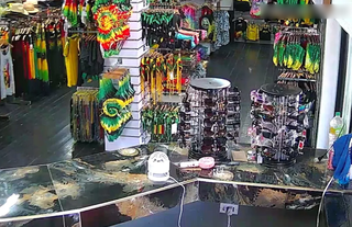 Tourist souvenir store offering clothing/gifts, serving visitors and benefiting from upcoming winter tourism activity.