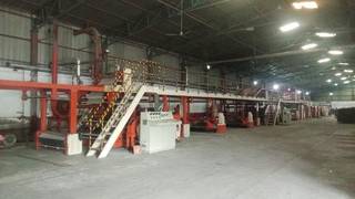 Profitable paper packaging business for sale in Morena, equipped with automated machinery and delivery fleet.