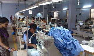 Manufacturing and selling of workwear / uniforms via online platform, seeking investment.