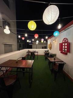Rooftop café in Kamanahalli, Bangalore with garden seating, renowned for delightful continental cuisine for sale.