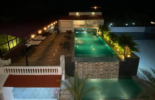 Convention center and banquet hall offering indoor/outdoor event spaces and pool, available for rent.