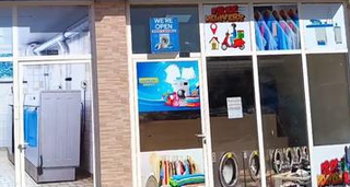 Umm Al Quwain-based laundry business with complete setup and local customer base, available for sale.