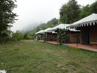 Operational 2 star luxury campsite with 12 rooms in Nainital is available for lease.