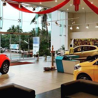 Established Trivandrum four-wheeler dealership with 18,000+ cars sold, available for sale or equity partnership.