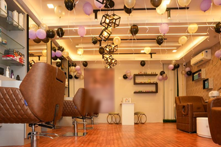 Unisex salon with thriving hair services available for full ownership with lease deposit in Bangalore.