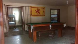Beachside tourist hostel for sale: ideal investment for leisure travelers and growth potential.