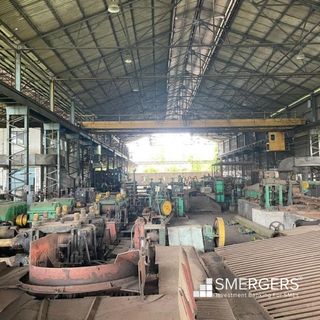 Plant & machinery of TMT bars manufacturing unit with electric-arc furnace, LRF, CCM, and rolling-mill.