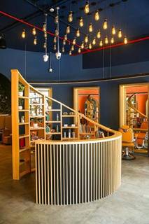 Fusion-themed ethically sourced, organic, vegan products, 2 rooms, 7 stations, 2 pedicure & nail stations.