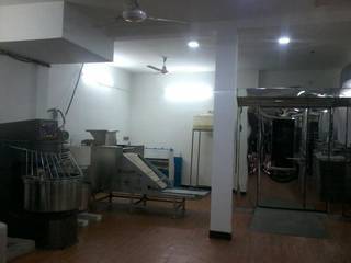 Manufacturing unit for rusk and biscuits under its own brand, producing 1,500 kg per day.