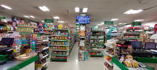 GST-certified Nilgiris franchise supermarket with 250+ daily walk-ins selling groceries, dairy, and bakery items.
