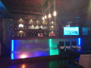 Sports bar and poker club with a fine dining restaurant on another floor.