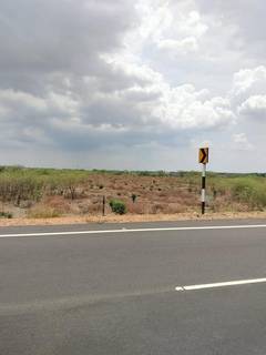 For sale: 4.43 acre commercial land with electricity access and 190 feet of highway frontage.