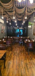 Acquire 50% stake in profitable 100-seat multi-cuisine restaurant and bar in Gurugram with liquor license.