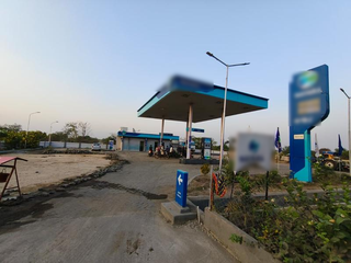 Nayara Energy petrol pump on state highway serving retail and transport fuel customers.