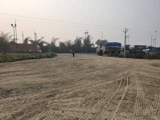 Commercial land generating monthly rent from a dhaba establishment with legal documents in place.