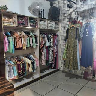 Business that customizes clothes based on their choice of fabric and has served 2k+ clients.