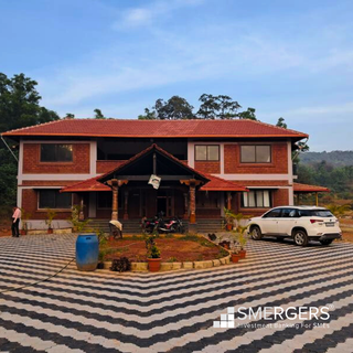 Resort for sale near Jog falls with 90% construction completed and 10k sq ft area.