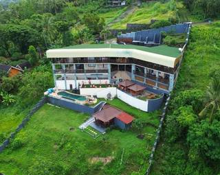For Sale: 8-bedroom Lombok-based non-operational guesthouse business with pool, ocean views, and Joglo cabin near Senggigi.